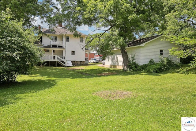 309 E Gay St, Warrensburg, MO 64093 - view of grassy yard with stairway