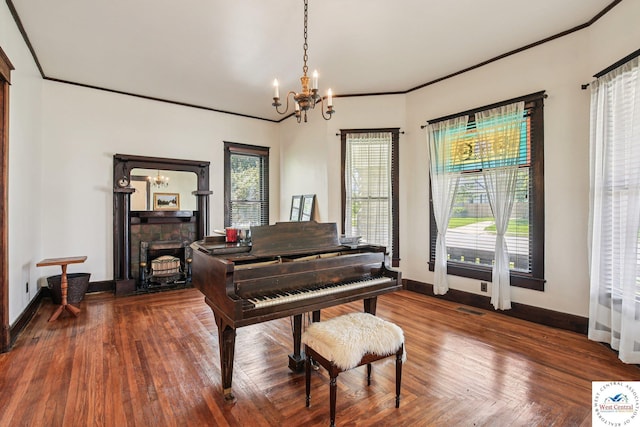 309 E Gay St, Warrensburg, MO 64093 - sitting room featuring a chandelier and ornamental molding