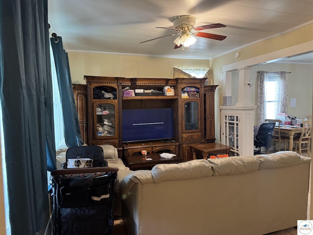 405 W 4th St, Sedalia, MO 65301 - living room with crown molding and a ceiling fan