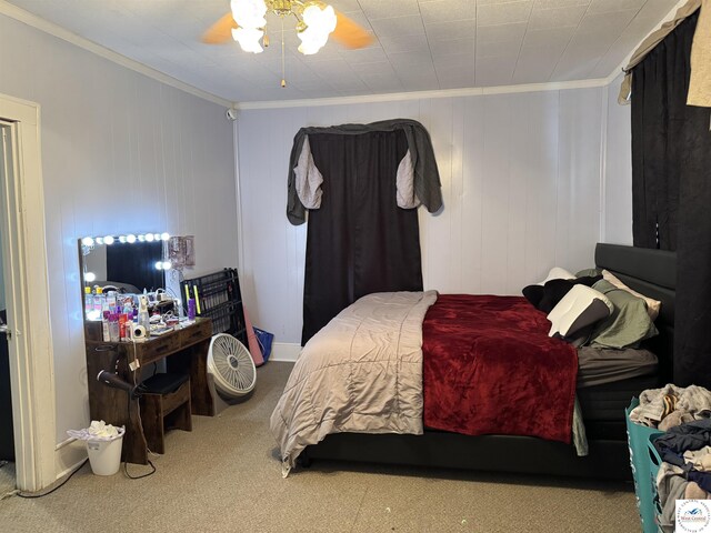 405 W 4th St, Sedalia, MO 65301 - bedroom featuring crown molding, ceiling fan, and carpet flooring