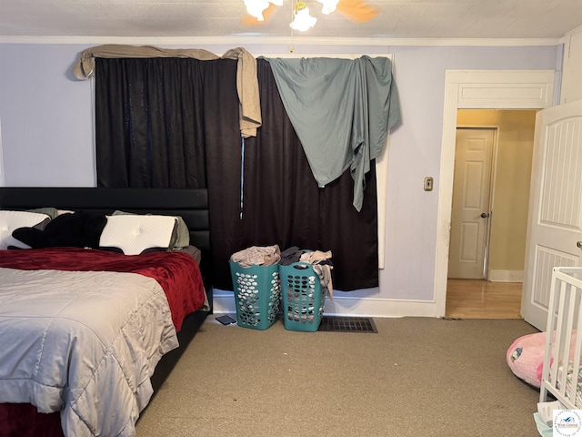 405 W 4th St, Sedalia, MO 65301 - bedroom featuring baseboards, carpet flooring, visible vents, and ornamental molding