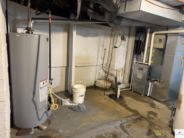 405 W 4th St, Sedalia, MO 65301 - utility room with gas water heater