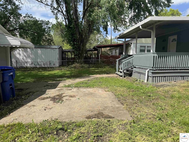 1404 S Grand Ave, Sedalia, MO 65301 - view of yard with a porch and fence