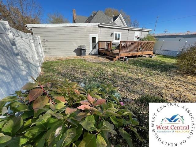 412 E Walnut St, Clinton, MO 64735 - rear view of property featuring a wooden deck