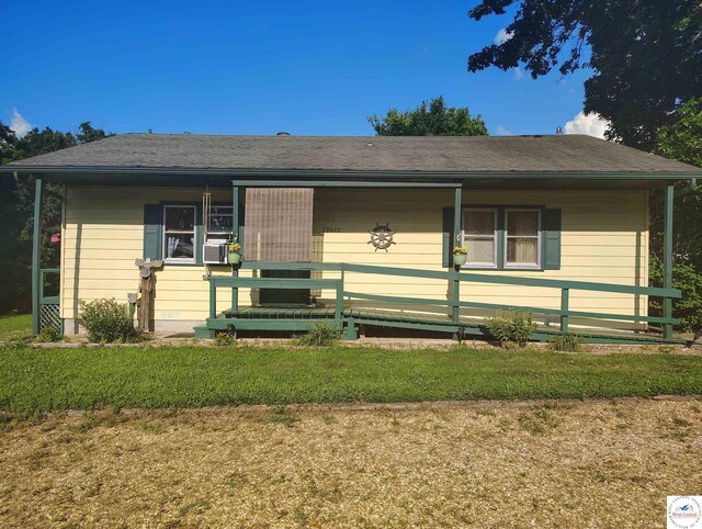 29620 Blue Grass Rd, Edwards, MO 65326 - view of front of house featuring a front lawn