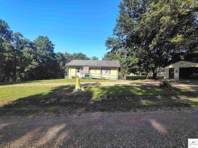 29620 Blue Grass Rd, Edwards, MO 65326 - view of front of home with a front lawn and an outdoor structure
