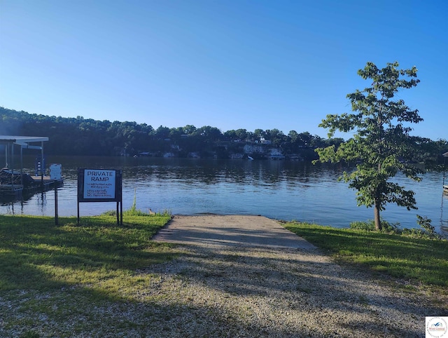 29620 Blue Grass Rd, Edwards, MO 65326 - water view featuring a boat ramp and a boat dock