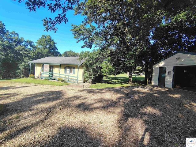 29620 Blue Grass Rd, Edwards, MO 65326 - view of front of home with an outdoor structure and a garage