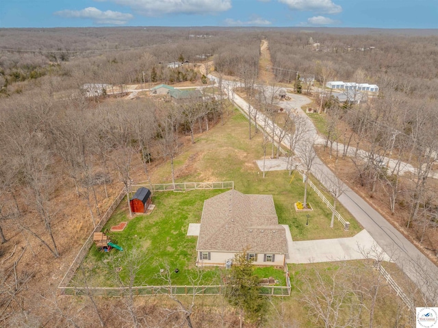 birds eye view of property with a rural view