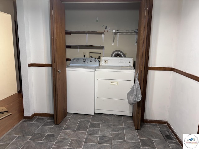 946 Red Bud Dr, Warsaw, MO 65355 - washroom with washer and dryer and baseboards