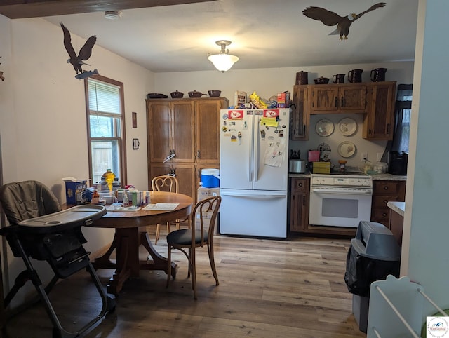418 W Gravel St, Clinton, MO 64735 - dining space with light wood-style flooring