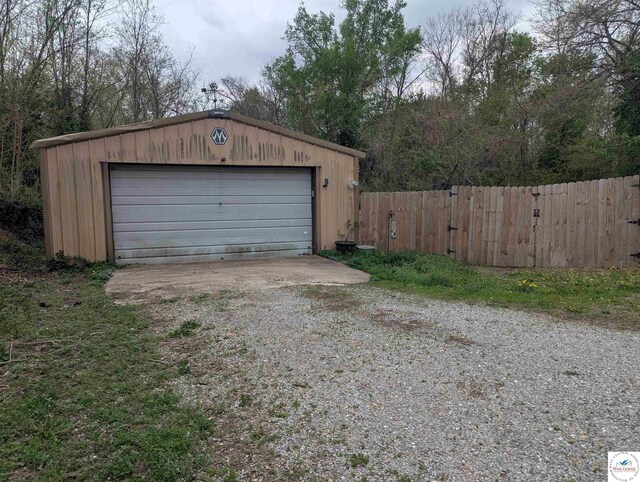 418 W Gravel St, Clinton, MO 64735 - detached garage with fence