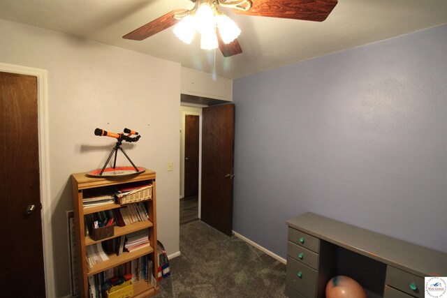 101 Lakeveiw Dr, Windsor, MO 65360 - office with dark colored carpet, a ceiling fan, and baseboards