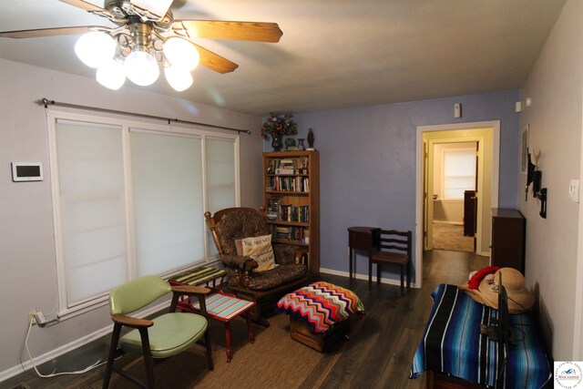 101 Lakeveiw Dr, Windsor, MO 65360 - living area featuring a ceiling fan, wood finished floors, and baseboards