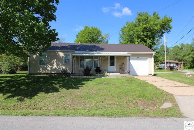 101 Lakeveiw Dr, Windsor, MO 65360 - ranch-style home with an attached garage, a front yard, driveway, and metal roof