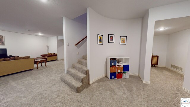 1519 Cobblestone Dr, Sedalia, MO 65301 - stairs with visible vents, carpet floors, and baseboards