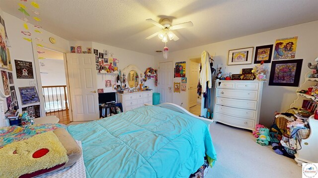 1519 Cobblestone Dr, Sedalia, MO 65301 - bedroom with ceiling fan and carpet floors