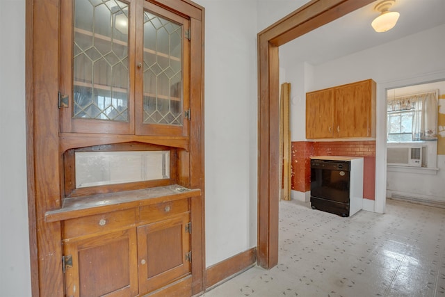 245 Randolph St, Tipton, MO 65081 - hall featuring baseboards, light floors, and cooling unit