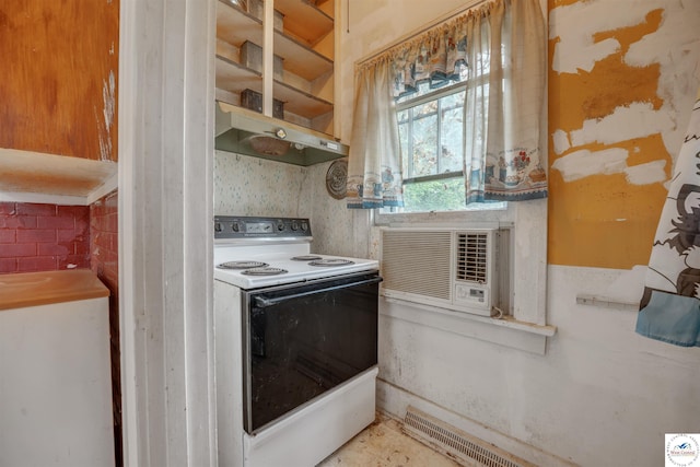 245 Randolph St, Tipton, MO 65081 - kitchen featuring white range with electric cooktop, cooling unit, and under cabinet range hood