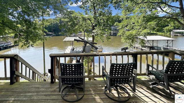 28801 Herbs Rd, Lincoln, MO 65338 - wooden terrace with a water view and view of scattered trees