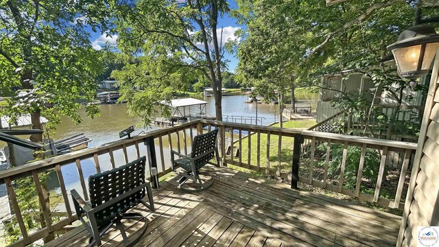 28801 Herbs Rd, Lincoln, MO 65338 - wooden terrace with a water view and a dock