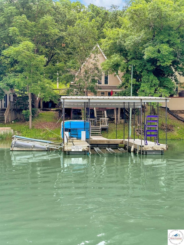 28801 Herbs Rd, Lincoln, MO 65338 - dock featuring a water view and boat lift