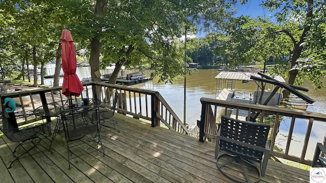 28801 Herbs Rd, Lincoln, MO 65338 - dock area featuring a deck with water view and outdoor dining area