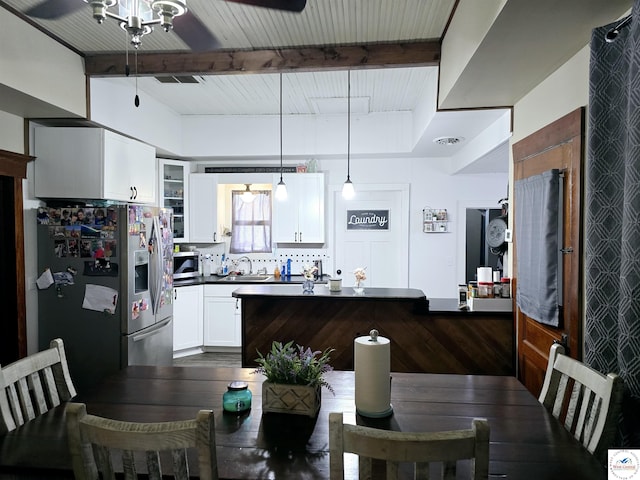 202 N Maple St, Stover, MO 65078 - dining room with beam ceiling