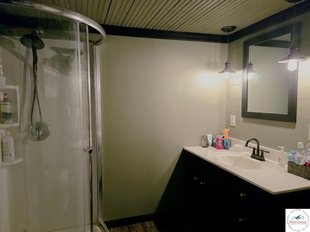 202 N Maple St, Stover, MO 65078 - bathroom with a shower stall, vanity, baseboards, and wood finished floors