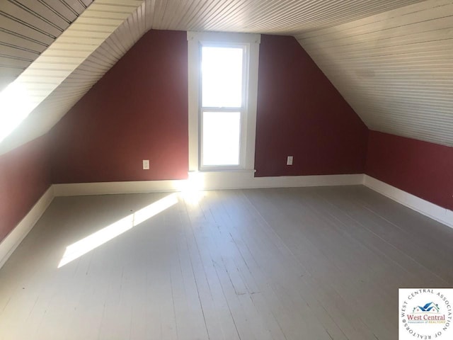 202 N Maple St, Stover, MO 65078 - bonus room with healthy amount of natural light, lofted ceiling, wood finished floors, and baseboards