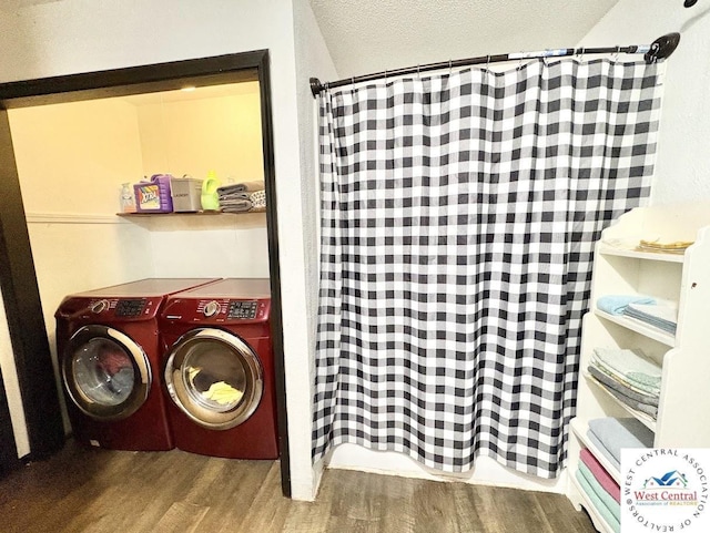 2704 Rosebud Cir, Sedalia, MO 65301 - laundry area with washer / clothes dryer and wood finished floors