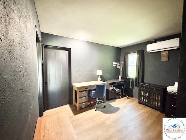 2704 Rosebud Cir, Sedalia, MO 65301 - office with a wall mounted air conditioner and wood finished floors