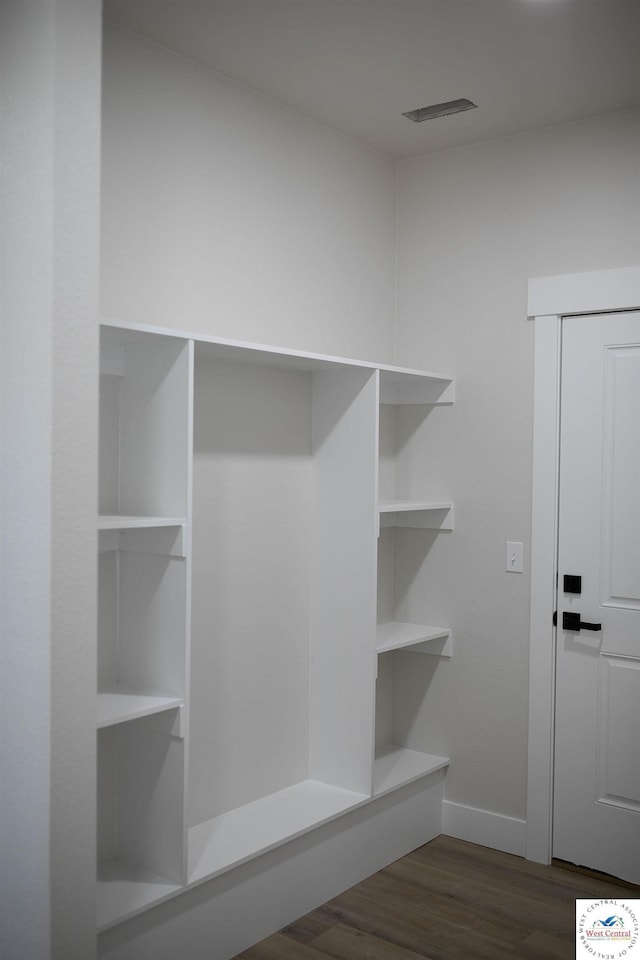 1927 E 6th St, Sedalia, MO 65301 - mudroom featuring dark wood-style flooring and baseboards