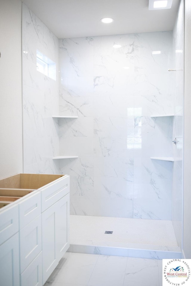1927 E 6th St, Sedalia, MO 65301 - bathroom with walk in shower, marble finish flooring, and recessed lighting