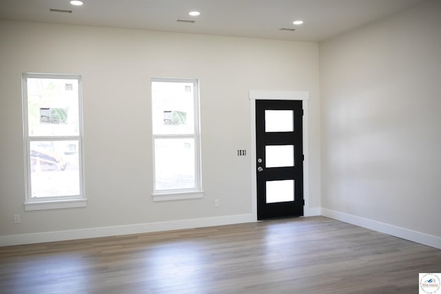 1927 E 6th St, Sedalia, MO 65301 - entryway with wood finished floors, recessed lighting, and baseboards