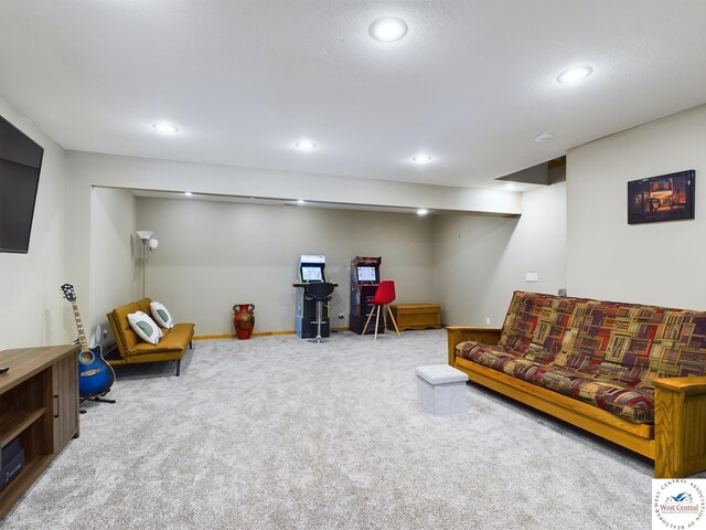carpeted living room featuring recessed lighting