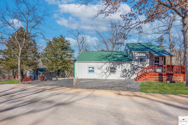 25939 Old Oar House Rd, Warsaw, MO 65355 - view of front of home featuring a wooden deck and driveway