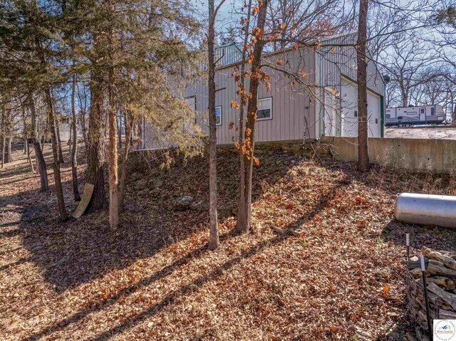 25939 Old Oar House Rd, Warsaw, MO 65355 - view of yard featuring a garage