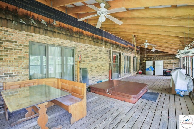 828 SE 601st Rd, Leeton, MO 64761 - deck with ceiling fan, outdoor dining area, and a covered hot tub
