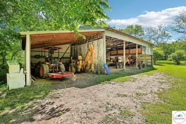 828 SE 601st Rd, Leeton, MO 64761 - view of pole building with a carport