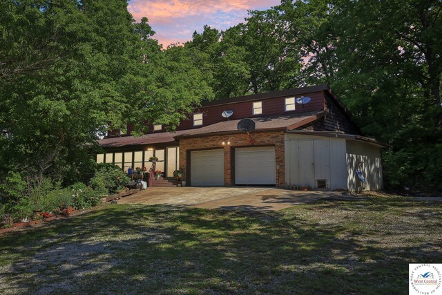 828 SE 601st Rd, Leeton, MO 64761 - view of front of property with concrete driveway