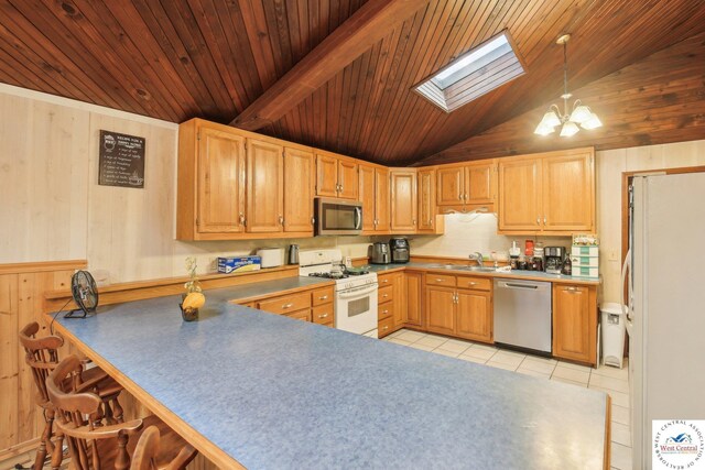 828 SE 601st Rd, Leeton, MO 64761 - kitchen featuring appliances with stainless steel finishes, light tile patterned flooring, a skylight, wooden ceiling, and a chandelier