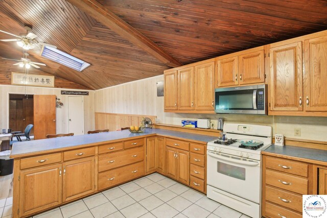 828 SE 601st Rd, Leeton, MO 64761 - kitchen featuring stainless steel microwave, gas range gas stove, wooden ceiling, ceiling fan, and a peninsula