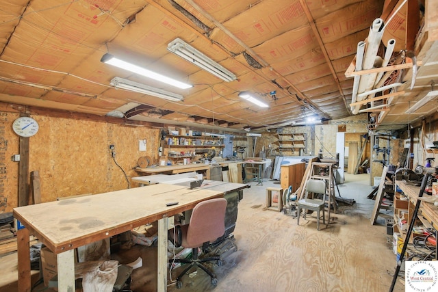 828 SE 601st Rd, Leeton, MO 64761 - basement featuring a workshop area