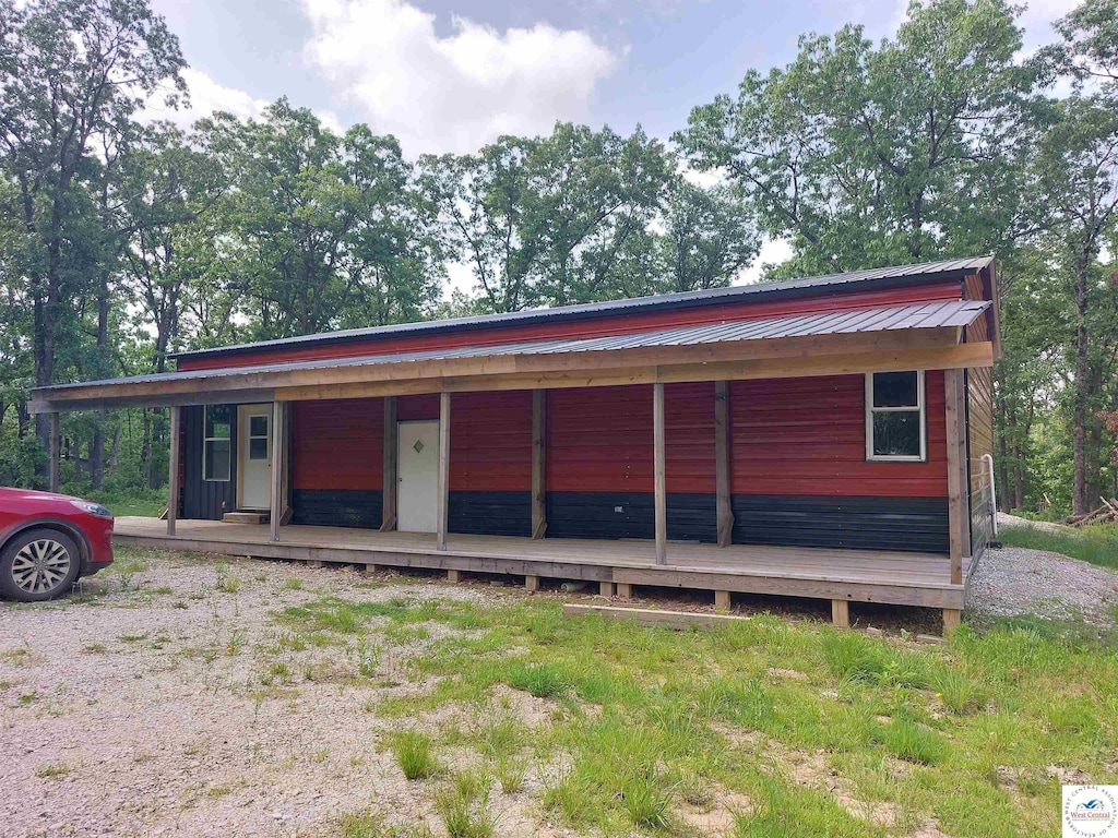 23690 135th Hwy, Stover, MO 65078 - view of front facade with metal roof and covered porch