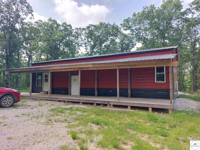 23690 135th Hwy, Stover, MO 65078 - view of front facade with metal roof and covered porch