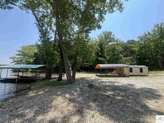 31674 Aspen Rd, Stover, MO 65078 - view of yard with a detached carport
