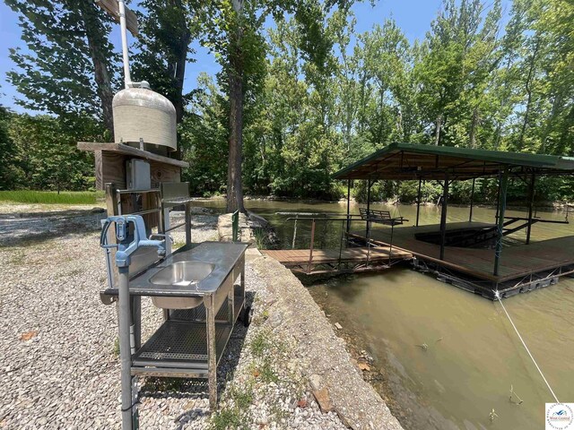 31674 Aspen Rd, Stover, MO 65078 - dock featuring a water view and view of wooded area