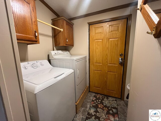 31674 Aspen Rd, Stover, MO 65078 - washroom featuring independent washer and dryer, cabinet space, and ornamental molding