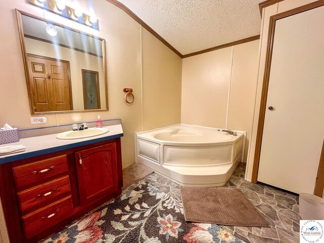31674 Aspen Rd, Stover, MO 65078 - bathroom featuring crown molding, vanity, a bath, and a textured ceiling